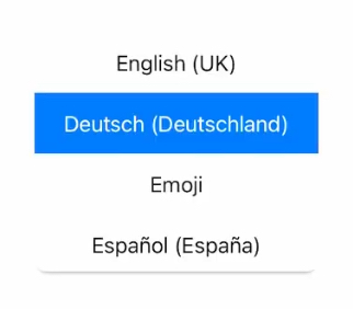 When ever i want to write with the german layout i simply use the 🌐 icon to switch to the german layout.