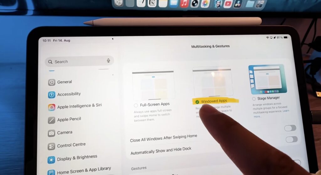 In the iPad Settings under Multitasking switch from Full Screen to Windowed App. Only then you get the menu bar and windows you can move around.
