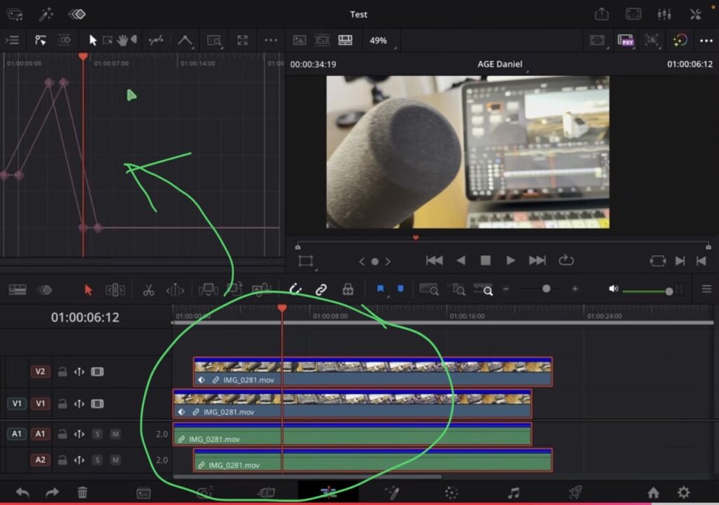 Stack two clips on different tracks and select both. Now the Keyframe Editor shows the keyframes of both clips.